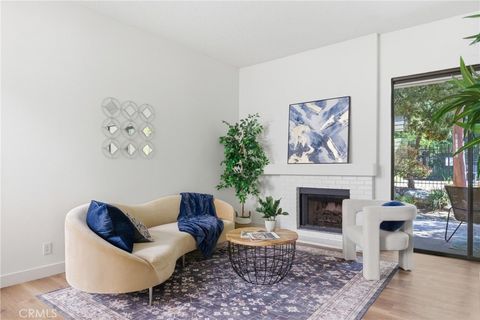 Photo of 4900 N Grand Ave #103, Covina, CA 91724 (MLS # PF26099318)