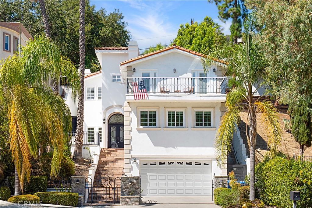 This modern hillside residence in Woodland Hills offers 4 expansive bedrooms, each designed as a private suite with its own bathroom and closet. Three of the suites extend to balconies, with two providing direct access to the serene backyard, seamlessly connecting indoor and outdoor living. Spanning 3,154 sq. ft. across multiple levels, the home showcases soaring ceilings, abundant natural light, and a refined contemporary design.
The property sits across from the Woodland Hills Country Club, surrounded by natural greenery and open views. A romantic multi-level yard, accessible from two of the suites, creates a tranquil setting for both relaxation and entertaining. Recently upgraded prior to its late 2023 purchase, the home reflects a sleek modern style with quality finishes throughout.
Located within the highly regarded Los Angeles Unified School District, nearby schools include Serrania Avenue Charter for Enriched Studies (K–5), Woodland Hills Charter Academy (6–8), and William Howard Taft Charter High School (9–12).