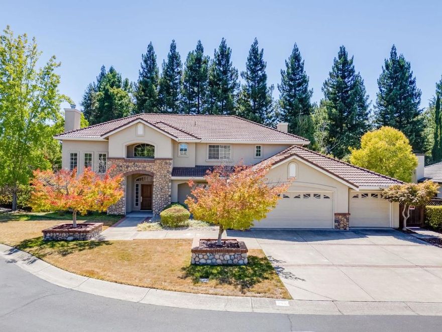 Nestled in the scenic foothills of Mt. Diablo State Park, 208 Kaitlyn Lane offers the best of Tri-Valley living. Enjoy a Mediterranean climate, wineries, craft breweries, outlet shopping, and endless hiking trails. This home sits in a peaceful cul-de-sac yet is minutes from conveniences. Families will love the proximity to top-rated schools: Diablo Vista Middle (walkable), Tassajara Hills Elementary (5 min drive), and Monte Vista High (17 min drive). Nearby Tassajara Crossing and Blackhawk Plaza feature Safeway, Century Theater, banks, pharmacies, and dining. The Mediterranean-inspired design showcases stucco, terracotta roof, and stone accents. Inside, a two-story foyer leads to a living room with soaring ceilings, clerestory windows, and fireplace. The dining room flows to a chef's kitchen with stainless appliances, granite counters, and breakfast nook opening to the family room with fireplace and patio access. The first floor includes a bedroom, full bath, and laundry. Upstairs: four bedrooms, two baths, including the primary suite with spa-like bath and walk-in closet. The backyard is perfect for entertaining with patio, lawn, mature landscaping, pool, and spa.
