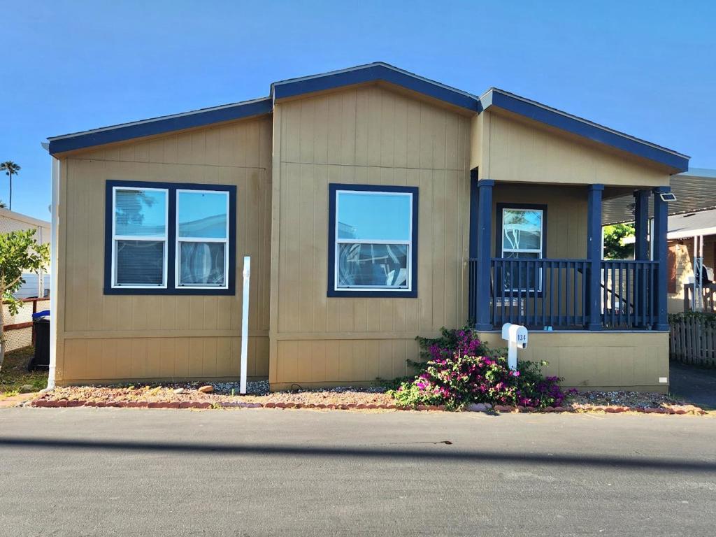 Welcome to your new home in Mountain View! 5-years young triple-wide manufactured home in an all-age community within walking/biking distance to Google. This spacious 1,618 sq ft residence offers comfortable living with three bedrooms and two full bathrooms. The primary bedroom has a walk-in closet and private bathroom with a separate shower and sunken garden tub. The kitchen is well-equipped for culinary enthusiasts, featuring modern amenities like granite countertops, stainless steel dishwasher, gas oven range, refrigerator and a functional island perfect for meal preparation or casual dining. The dining area complements the kitchen, providing a great space for family meals or entertaining guests. Versatile front room could be used as an office or extra bedroom. The home is climate-controlled with central AC and central forced air heating, ensuring year-round comfort. Low maintenance yard with good-sized storage shed at the end of the driveway.