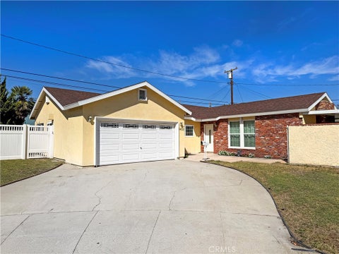 Photo of 9403 Irwingrove DR, Downey, CA 90241 (MLS # DW26226387)