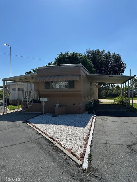 Photo of 7000 E GAGE AVE Ave #21, Bell Gardens, CA 90201 (MLS # DW26055052)