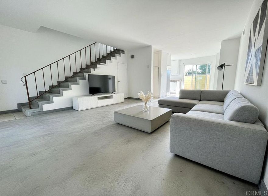 Welcome home to this move-in-ready, private two-story condo! Step inside to a open living room—perfect for entertaining or relaxing at home. The first floor also features the kitchen, a dining area, and a convenient bathroom Upstairs, you’ll find two bedrooms and an additional  bathroom. Enjoy the convenience of your own private, full-size front-loading washer and dryer, with an additional community laundry room located near the pool. Parking is a breeze with two assigned spaces, plus  guest parking. This community is ideally located—just 60 seconds to the freeway, 20 minutes to Naval Station San Diego, and under 20 minutes to Downtown San Diego and Mission Valley.  Don’t miss your chance to own this comfortable, centrally located home!