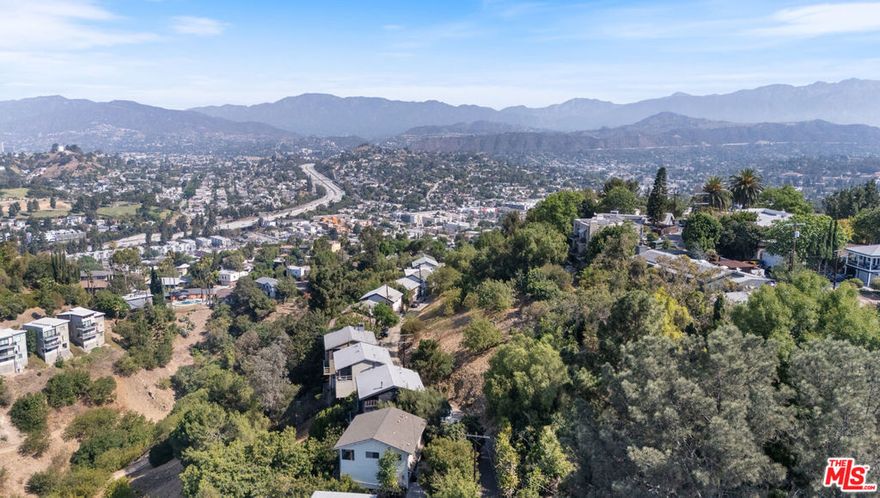 Views!!!! City-approved geology and preliminary plans included. Comps on the same street and within a 1/4 mile radius range from $1.2M to $1.9M. Situated in prestigious Glassell Park, this hillside property enjoys paved street access, public sewer in close proximity, and spectacular vistas including sweeping sunsets over Downtown L.A. and Griffith Park. Set within a peaceful, lush enclave, you're steps away from Elyria Canyon Park's scenic trails, the serene Rio de Los Angeles State Park, and the Frogtown bike-pedestrian bridge. The neighborhood thrives with quaint cafes, independent businesses, and craft-oriented charm, yet remains highly connected to Glendale, Eagle Rock, and Mount Washington with convenient transit and freeway access.