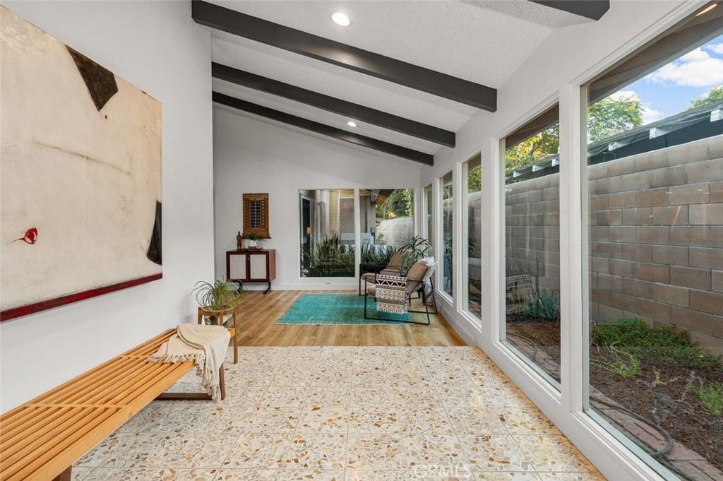 Photo of 5360 E El Jardin Street, Long Beach, CA 90815 (MLS # RS25258341)