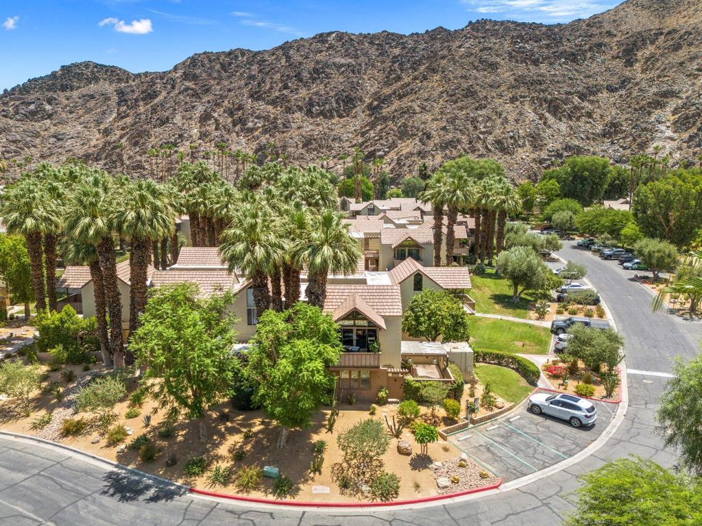 Welcome to this exquisite 2-bedroom, 3-bathroom condo nestled in the heart of Indian Wells, across from the BNP Tennis Tournament and next door to historic Indian Wells Country Club. Spanning 1,152 square feet, this turnkey furnished residence exudes elegance and modern comfort. The bathrooms have been remodeled to exquisite tasteStep inside to discover the seamless blend of style and functionality. The home features ceramic floors throughout, accentuated by tasteful window treatments. The ambiance is enhanced by chandeliers and recessed lighting, creating an inviting atmosphere perfect for both everyday living and entertaining.The heart of the home is the open kitchen, outfitted with premium counters and marble kitchen surfaces. Culinary enthusiasts will appreciate the stainless steel appliances, wine cooler, and breakfast bar, making meal preparation a delightful experience. Adjacent to the kitchen, a cozy dining alcove offers a charming space for intimate meals, and living room that opens up to 2 of the 3 patios..Relaxation and leisure extend outdoors to a large patio and barbecue area, with 3 seating areas perfect for hosting gatherings or enjoying a quiet evening under the stars. This tiled patio is outfitted with comfortable lounging furniture, dining table, party lights, BBQ, and outdoor heaters.Convenience is key, with a laundry room equipped with a washer and dryer, adding to the ease of everyday living. This condo is a sanctuary of luxury and practicality, awaiting its new owner to make it their own. Seven day rentals are available, with a current rental manager for a seamless transfer. Embrace the opportunity to experience this exceptional lifestyle in a prime location.
