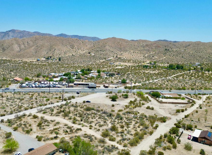 Nestled near Highway 62, this exceptional vacant land offers the perfect balance of convenience and seclusion. Enjoy easy access to nearby shops, restaurants, and entertainment while immersing yourself in the tranquility of your own private retreat. Boasting breathtaking panoramic views, this property showcases the stunning beauty of the surrounding landscape--from majestic mountain peaks and expansive valleys to the serene desert scenery. Whether you're looking to build your dream home, a vacation getaway, or explore commercial possibilities, this land provides a canvas of endless potential. Design your property to take full advantage of the picturesque surroundings, or simply embrace the open space for recreation, relaxation, and off-grid living. Its prime location places you just minutes from Joshua Tree, Palm Springs, and other sought-after destinations, making it a rare investment opportunity. Don't miss your chance to own a piece of the stunning Morongo Valley--where natural beauty meets limitless potential. Contact us today for more details!