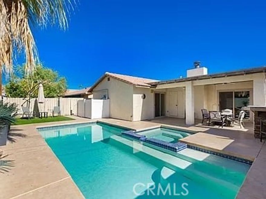 This beautifully maintained 3 bedroom, 2 bathroom POOL & SPA home in La Quinta offers 1,673 sq ft of comfortable living and is a rare value in today’s market. The interior boasts updated features such as a remodeled kitchen with granite countertops and modern finishes, and the light, open layout flows seamlessly to the outdoor space. Outside, enjoy your own private salt water pool (a standout feature in this price range), low-maintenance landscaping, and an ideal location near the base of the La Quinta Cove. This is truly a move-in ready home that balances comfort, style, and excellent value for buyers looking to own in this superb area; located close to the fabulous restaurants in Old Town La Quinta, the supermarket, kids park and just a short walk over to the many hiking trails in the Cove.