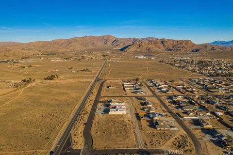 Photo of 706 Outer Hwy 18 S, Apple Valley, CA 92307 (MLS # HD26045942)