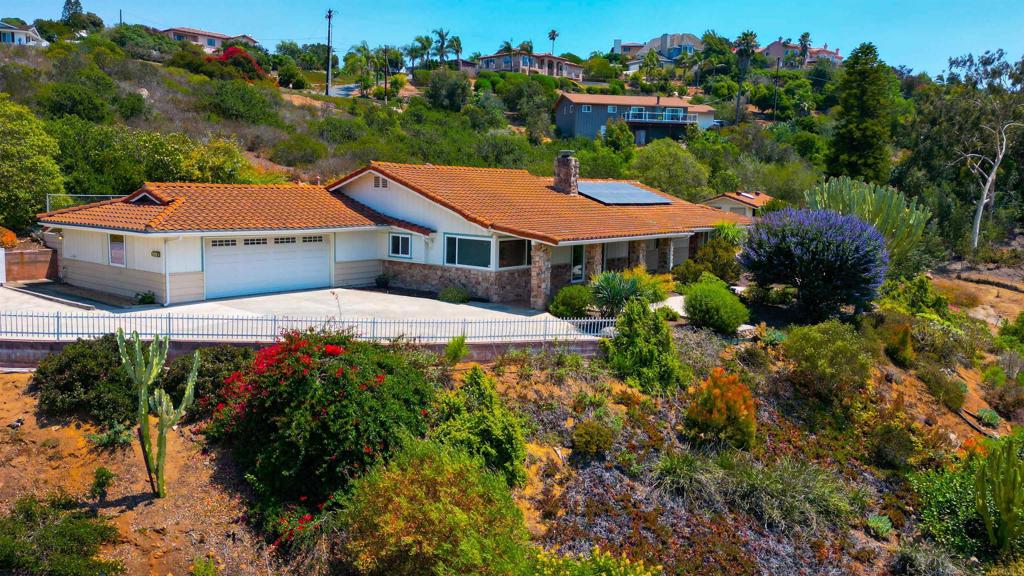 Views, Views, Views! Vista hills single-story home with no bi-levels or interior steps. Sitting on a .92 acre lot looking Northwest to Sleeping Indian and Pendelton. Priced to sell, way under market value, with lots of room for investment improvement. No other home for sale in Vista has this size lot, this size single level home (2517 sq. ft. 3 bedroom/2.5 baths), these views, and this much potential for under a million. Oh, and did I mention the unfinished ADU? It was used as a workshop but could be an office, workout room, guest room, so many possibilities. Mid-century modern feel with a rock fireplace and large living and family rooms. Septic system has been pumped and certified. So much potential, bring your design aesthetic and turn this home into the showcase it deserves.
