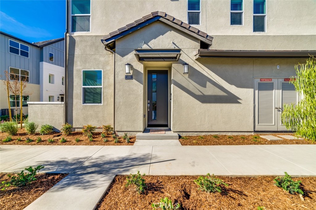Welcoming, fresh, and modern – this stunning 4-bedroom, 4-bath, three-story townhome offers the best of vibrant urban living in the highly sought-after community of The Resort in Rancho Cucamonga.
Step inside and find a thoughtfully designed home with spacious living areas, contemporary finishes, and room for everyone to enjoy. The open layout creates the perfect setting for gatherings, while private bedrooms and baths provide comfort and convenience for the whole household. On the third floor, a bright and expansive full loft offers incredible flexibility—perfect for a home office, media room, or entertainment lounge.
Beyond your door, a bright new urban village awaits. Spend your weekends poolside at the clubhouse, meet up with friends for shopping and dining just steps away, or lace up your shoes and explore nearby trails. For a breathtaking backdrop, take in the beauty of Mt. Baldy as the sun sets.
Living here means more than just a home—it’s a lifestyle. With a true sense of connection and a community that feels alive, life at The Resort is where you’ll find your center.
Property will be unfurnished.