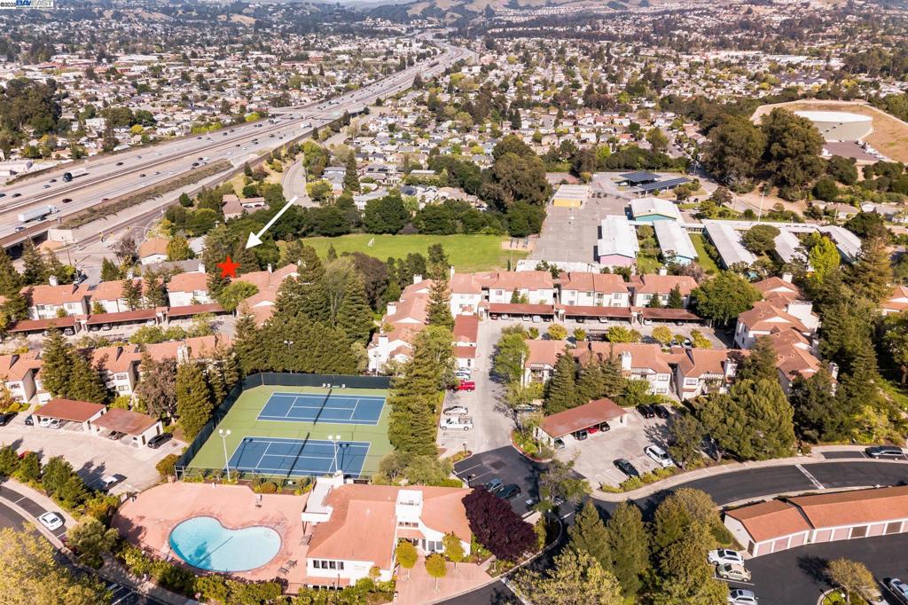 Welcome to your beautifully remodeled oasis in a coveted locations within the community! This move-in ready condo offers the perfect blend of style, comfort, and great value. Situated near the community main entrance, you'll enjoy effortless access to resort-style amenities including sparkling pools, a vibrant clubhouse, tennis courts, and a modern fitness center, all surrounded by lush gardens and mature trees.-- Step inside to discover vaulted ceilings, gas fireplace, a modern kitchen featuring sleek quartz countertops and an oversized sink, perfect for cooking and entertaining. The modern bathrooms were designed with double sinks with style and comfort in mind. What truly sets this unit apart? Its private, tucked-away corner location means no neighbors above or directly across, offering additional privacy. Whether you're lounging poolside, playing a match on the courts, or hosting friends in the community room, everything is just steps away. With fantastic amenities, a prime location, and exceptional value, this home is a standout opportunity you won’t want to miss. Come see it today—you’ll be pleasantly surprised! Views: Downtown