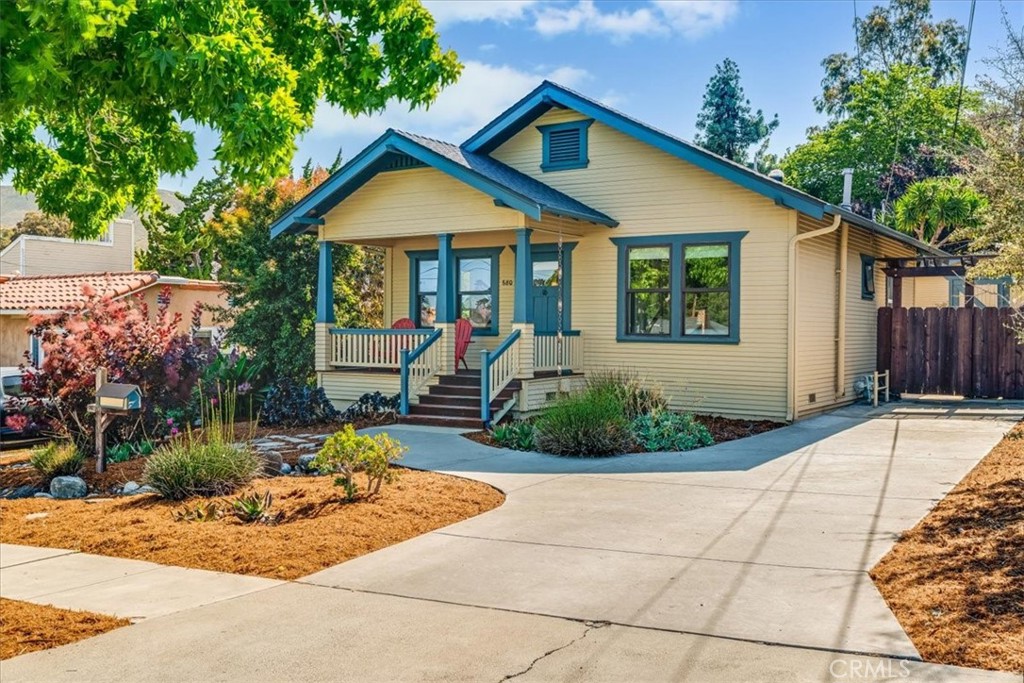This vintage bungalow is abundant with thoughtful lovely updates for modern living. A few highlights include solid surface countertops, custom cabinets, bright and light main rooms, old-town SLO-style front and back porches, original double pocket parlor door to front bedroom. HVAC Heat Pump system includes air conditioning. Convenient laundry room off rear porch. Rear yard has private feel and a gracious patio that extends the home living area to an entertaining delight. The detached carriage house garage includes a workshop area and separate partially finished room for storage, WFH, or creative pursuits. Whimsical landscaping, charming mailbox, and acorn door knocker make this home complete.
