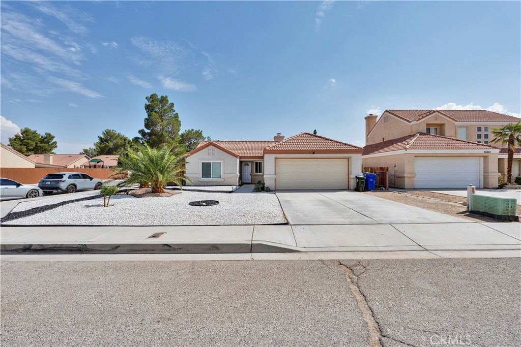 Welcome to this beautifully renovated 3-bedroom, 2-bathroom home located on a spacious corner lot in Adelanto. Offering 1,313 sq. ft. of living space on a 7,686 sq. ft. lot, this property combines comfort, style, and convenience. Renovated in 2022, the home features a new roof, new windows, updated HVAC system, new gas water heater, and modern appliances—ensuring peace of mind and energy efficiency for years to come. Inside, you’ll find a functional layout with plenty of natural light, making it the perfect space for both everyday living and entertaining. The large lot provides ample outdoor space, ideal for gardening, play areas, or even future expansions. Plus, with the home’s corner lot location, you’ll enjoy added privacy and curb appeal. Conveniently situated just 2 miles from Highway 395, commuting and access to shopping, dining, and nearby amenities are a breeze.This turn-key home is a fantastic opportunity for first-time buyers, growing families, or investors looking for a solid property in a growing area.