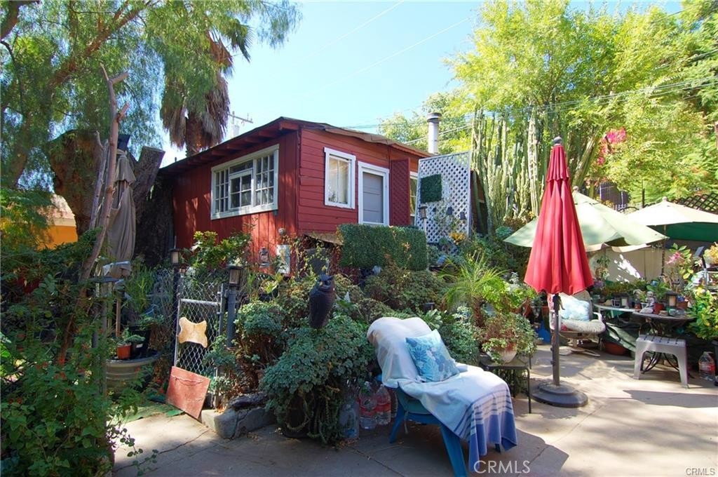 Ideal Family Compound or Incredible Development Opportunity located in Chatsworth Lake Manor (unincorporated LA county). This unique property presents a rare opportunity for development or creating a multi-generational family retreat. Spanning seven individual parcels, over 16,000sqft the land stretches from Franklin Street to Johnell Road and includes two homes, multiple structures, and established utility infrastructure. House #1: Originally permitted as a 1-bedroom, 1-bath home (currently configured as 2 bedrooms). The home requires significant repairs. The garage, included in the assessor’s square footage, has been converted into an unpermitted studio. Additionally, a gazebo on the property was converted into an unpermitted studio apartment. House #2: Permitted as a 1-bedroom, 1-bath home. Also in need of substantial repairs. Infrastructure Includes: Three septic systems, Main SCE electric meter at House #1, with two sub-meters servicing House #2 and the garage, Two separate Las Virgenes Water District meters, one for each house. With flexible layout potential and expansive land across multiple legal parcels, this property offers tremendous value for investors, builders, or families looking to create a private compound. Buyer to verify all permits, square footage, and zoning options.