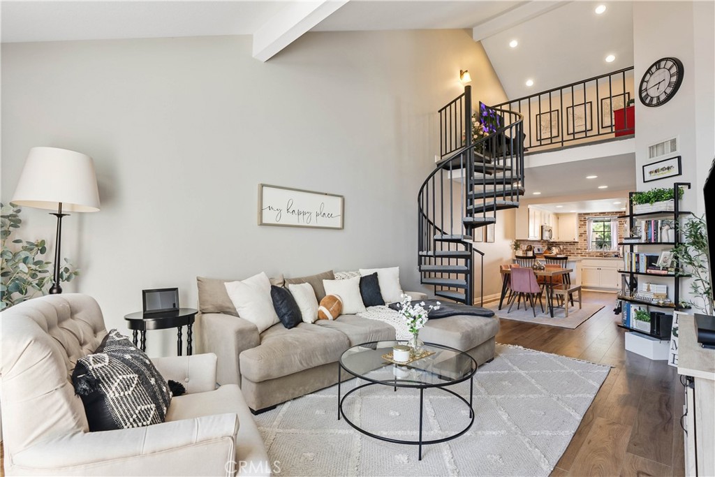 Welcome to 18108 Erik Court Unit 586 – A Stunning, Fully Upgraded Top-Floor Condominium! This beautifully renovated, move-in ready condo offers nearly 1,200 sq. ft. of light-filled, open-concept living space in a peaceful, well-maintained community. Nestled among tranquil walkways and lush landscaping, this home is a true retreat. Step into the spacious living room featuring a gorgeous brick fireplace, perfect for cozy evenings. The adjoining balcony is ideal for BBQs and relaxing outdoors, extending your living space into the serene surroundings. The chef’s kitchen is a showstopper, boasting natural stone quartzite countertops, brick backsplash, stainless steel appliances, and lots of cabinet and counter space – a dream for any home cook. The primary suite is a luxurious escape with soaring ceilings, a fully upgraded walk-in tiled shower, and a dual-sink vanity with modern finishes. The second bedroom is generously sized, and the versatile loft area - which has been extended over the dining area plus a bonus room - offers endless possibilities. Use it as a third bedroom, a private office, or a cozy lounge.
Additional upgrades include:
New carpet in the bedrooms for added comfort
Upgraded guest bathroom vanity and sink
Recessed lighting and ceiling fans in the bedrooms
Central air and heat
Washer and dryer included
Newer water heater
Two-car garage with a new door and opener, plus added storage
Community amenities include a sparkling pool and spa, with trash and water included in HOA dues. Conveniently located near the 14 freeway, top-rated schools, shopping, and dining.
This exceptional home won’t last long – schedule your private showing today!