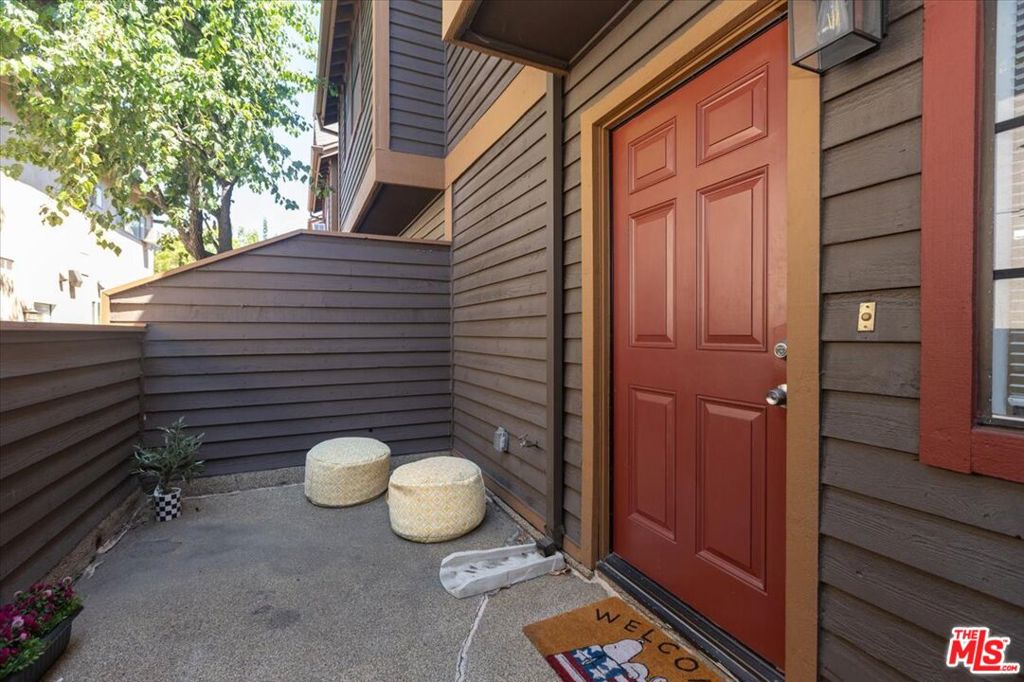 Nestled in the heart of Pasadena on a tranquil street, this two-bedroom, three-bathroom town home is a charming split-level residence with an enclosed front porch.You're welcomed by the spacious living room, with a fireplace, and laminated floors throughout the unit. Making your way to the bright kitchen you'll notice the white counters and cabinets with a cozy dining area and a cute built in desk. Upstairs you have your primary and secondary bedroom, both having their own bathrooms. All the way downstairs is the attached two car garage with the washer and dryer. This property is conveniently located near retail shops, a variety of dining options, and provides easy access to the freeway.