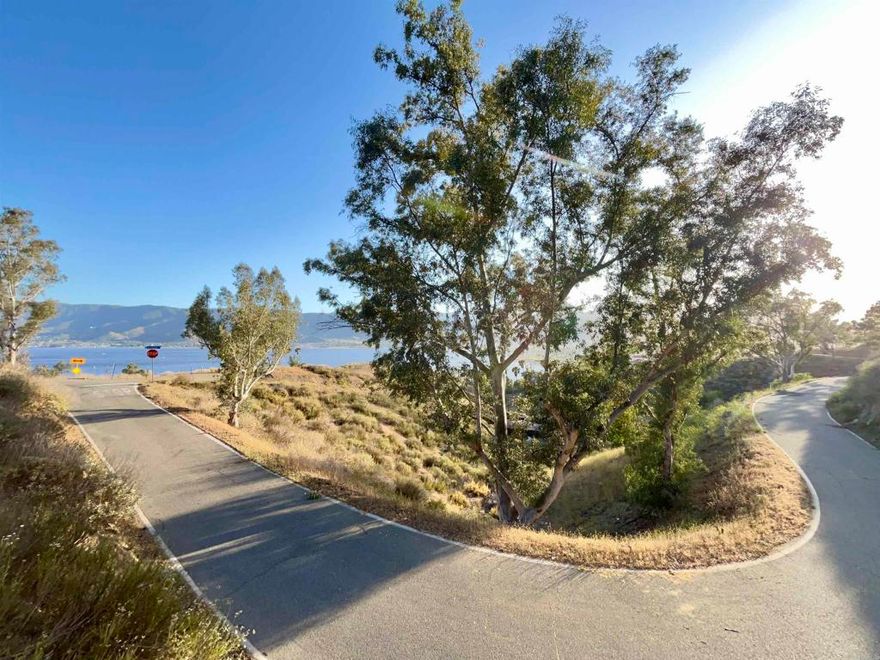 Discover this lot with walking distance to the lake, with seclusion and amazing views to the lake and mountain, Quick drive to outlets, lake, schools and to the main city, Near to freeway.  Property does not have an assigned address- For Listing Porposes only. GPS (33.68184377514769, -117.35468594024022)