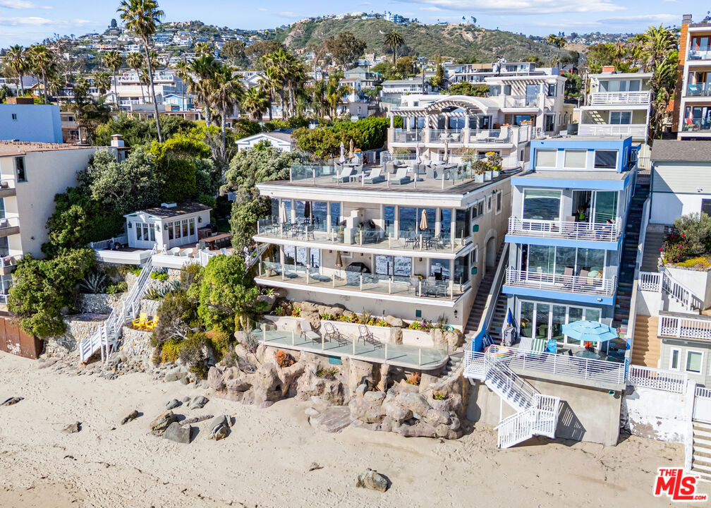 SHORT-TERM RENTAL PROPERTY. Located on the sand in Laguna Beach with direct beach access, Sunset Cove Villas is an 8-unit multifamily investment opportunity. The property has 8 short-term rental permits with a unit mix range of one-, two-, and three-bedroom floorplans. All units include private outdoor space, entertainment system, fireplace, new vinyl window & sliders, canned lighting, forced heat & A/C, upgraded gourmet kitchen, upgraded bathrooms and ocean views.