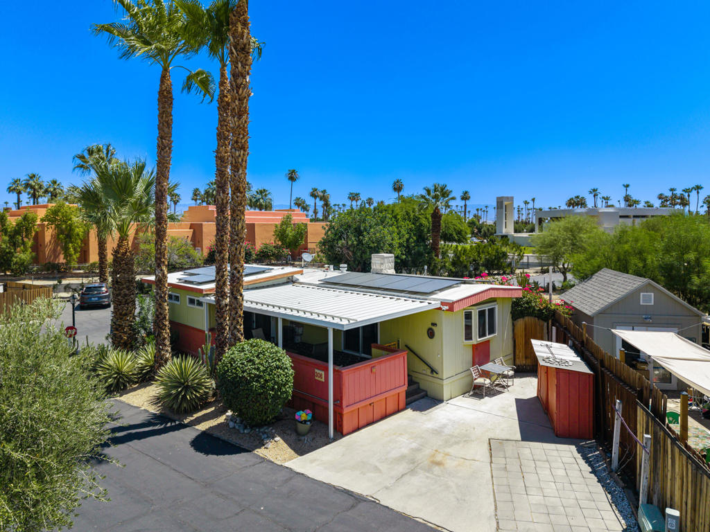 This inviting 1 bedroom, 1.25 bath home features an open floor plan and is located in the desirable 55+ Ramon Mobile Park. The home boasts a full-sized kitchen with ample counter space and full-sized appliances, perfect for those who love to cook and entertain. Recent upgrades include new flooring throughout and an updated shower for a fresh, modern feel.For added convenience, a laundry hookup with a new washer and dryer has been recently installed, eliminating the need for trips to the laundromat.Enjoy scenic mountain views from the front patio and a private backyard with a cozy patio area and a storage shed. The home also comes with a paid-off solar system that zeros out your electric bill, keeping utility costs at a minimum and providing eco-friendly benefits.Conveniently located within walking distance to Ralphs, CVS, Starbucks, the library, and the Mizell Senior Center, this home offers easy access to everyday essentials and community amenities. Whether you're a seasonal snowbird or looking for a year-round residence, this home is an excellent choice.