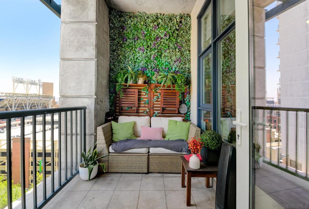 As you open the door, the 10-foot ceilings add to the open, spacious, light, bright feel, of this PENTHOUSE condo at Trellis Fifth Avenue in the Gaslamp District!! The look of a warm, rich, wood floor, a kitchen that features granite countertops, stainless appliances, GAS stove and oven, and ample wood cabinetry, over looking the dining area and living room leads to an expansive view over 6th avenue and beyond. The two bedrooms and two bathrooms are separated, on either side of the living space, adding a level of privacy… to each. Relax on the balcony, with a southwest view of Petco Park and the Coronado Bridge, or walk southeast along K street, 5th and 6th avenues where you’ll find some amazing places to eat, like Romanissimo Cucina, The Melt, Zzan Sushi & Soju, STK Steakhouse, Café Sevilla, Vin de Syrah, and many others. There are so many options. If you prefer a full body workout on your schedule, head to the 2nd floor 24-Hour gym, or to the terrace courtyard with friends, complete with tables, chairs, barbecue grills, couches, lounging areas and plants for a serene outdoor living ambiance amidst the city. Wanting to get out? It’s 1 block to Petco Park, 2 blocks to the Convention Center, easy access to the harbor, Rady Shell, Seaport Village, Waterfront Park and a diverse array of shops, restaurants, cultural and historic landmarks, as well as the means to go well beyond by accessing the trolley and train station. Trellis is a controlled access building with secured underground parking and onsite security 7 nights a week. The HOA also covers the cost of water, trash, and sewer. If CITY LIFE is what you’re looking for, with a Walk Score of 99, you’re not going to get any better!
