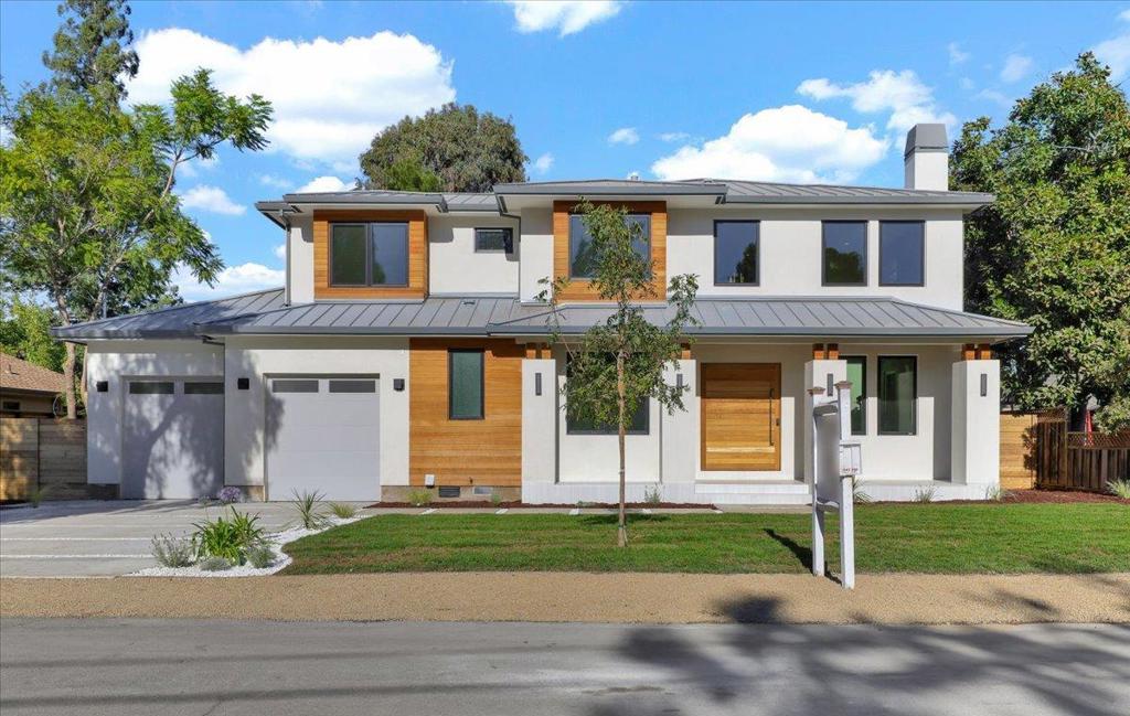 This newly constructed property with modern architectural design provides perfect blend of clean lines and sophisticated color palette: light gray metal roof mixed with white acrylic smooth stucco, highlighted by natural stain clear cedar wood siding. Nestled on a spacious 10,055sf lot, this stunning property offers 6 bedrooms and 5.5 bathrooms. Two full suites on 1st floor, both come with curbless shower design that is ideal for easy wheelchair access. Upon entering the property through custom pivot door, living area presents breathtaking 20ft ceiling with abundance of natural light. The high-end kitchen features top-of-the-line Monogram appliances with built in panels, custom cabinets, and a magnificent quartz waterfall island. Large sliding door connects you to a spacious covered patio finished with high end clear cedar wood siding in the ceiling. This space promotes outdoor activities and facilitates quality time with the family in backyard. Lounge on the unique box window in the bedrooms to take a nap or read a book. It's the perfect way to pamper yourself under California sunshine. The prime Mountain View location serves easy access to Cuesta and Bubb Park, Bubb Elementary School, Graham Middle School, 85 and 237 Highway, and convenient commutes to major tech companies.