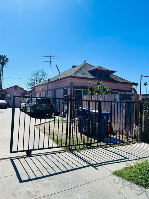 Photo of 920 E 48th St, Los Angeles, CA 90011 (MLS # DW26054950)