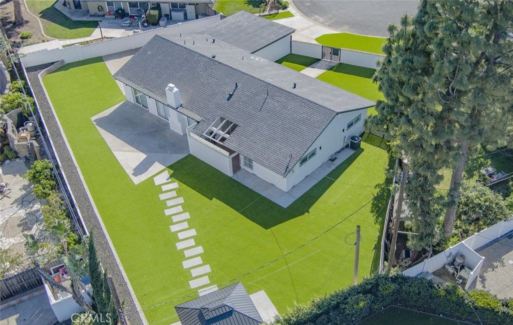 Photo of 17965 Wellington Ave, Tustin, CA 92780 (MLS # PW26054201)