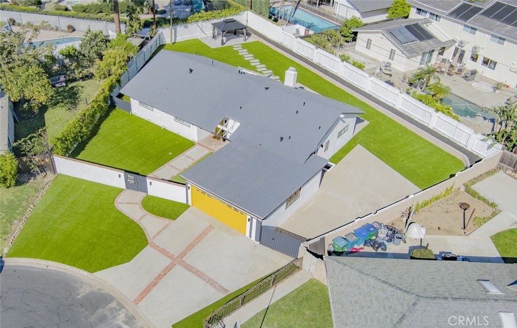 Photo of 17965 Wellington Ave, Tustin, CA 92780 (MLS # PW26054201)