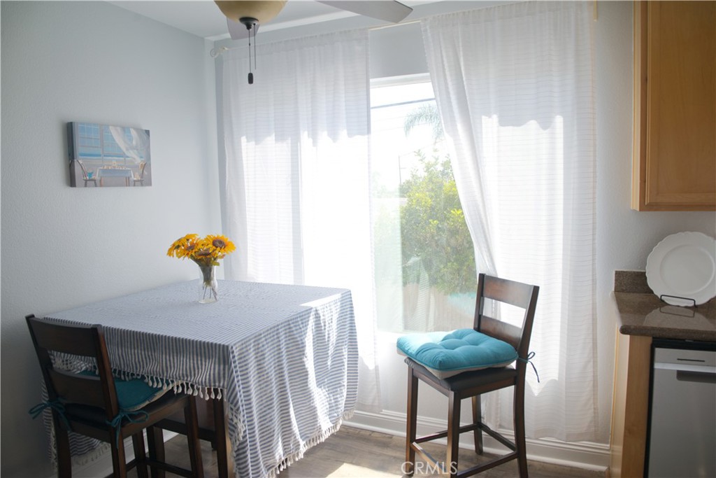 Light-filled and lovingly maintained, this desirable second-floor condo in the immaculate Adela community is just a short walk from the best of Normal Heights and Kensington. Nestled a couple of blocks away from the vibrant dining and shopping district on Adams Ave, the freshly painted gated complex features a large pool, a spa, and a recently upgraded fitness center. Peekaboo mountain views from the dining nook and lush tropical landscaping — birds of paradise and palm trees — make every day feel like a vacation. You can enjoy a private patio with outdoor storage perfect for bikes and surfboards. It even has in-unit laundry with a stacked washer and dryer (a true rarity in San Diego!), plus a dedicated off-street parking space. A brand new stove, easily maintained wood laminate flooring, and fresh paint throughout make this home completely move-in ready.