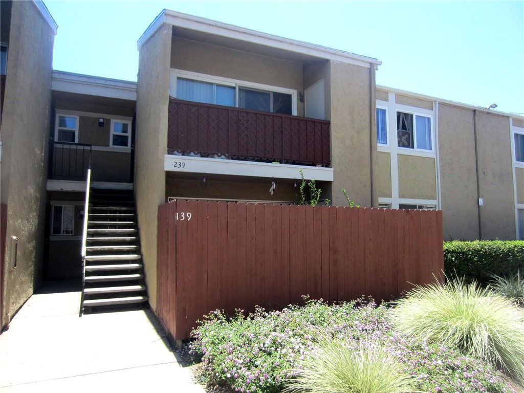 Live Auction! Bidding to start from $295,000! Welcome to this beautifully updated 2-bedroom, 1-bath condo in the gated community of Midway North! This ground-level unit features tile flooring throughout, crown molding, and a bright, open layout. The kitchen includes all appliances—refrigerator, stove, dishwasher, washer, and dryer. The spacious primary bedroom offers a walk in closet, and the private, enclosed patio is perfect for pets or outdoor relaxation. This unit comes with one carport and one assigned parking spot. Enjoy resort-style amenities including two pools, and picnic areas. HOA also includes Water, Sewer, and Trash. Conveniently located near shopping, dining, schools, and parks. A fantastic opportunity for first-time buyers, downsizers, or investors—don’t miss it!