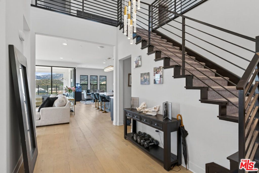 Photo of 21166 Canyon View Place, Chatsworth, CA 91311 (MLS # 25585659)