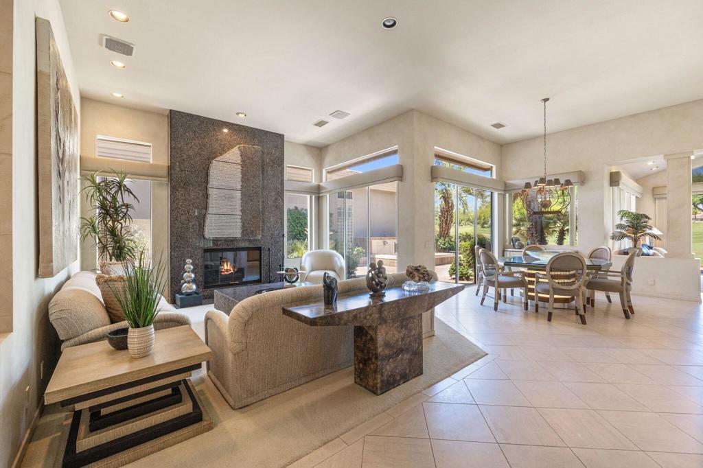 Don't miss this rare opportunity to own the lowest-priced single-family home with a club membership in the highly sought-after Indian Ridge Country Club! This model Smoke Tree 2 floor plan features 3 bedrooms, 3.5 bathrooms and is being offered fully furnished, making it move-in ready. The roomy primary retreat also boasts two generous walk-in closets, offering ample storage and convenience. Enjoy a spacious layout with clerestory windows that bring in beautiful natural light and a large patio which showcases an expansive double fairway with majestic western mountain views. The monthly HOA dues provide exceptional value, covering everything from internet and cable, exterior water and electric, roof and exterior maintenance, all landscaping, to 24/7 security, trash, fire insurance on the structure, and more. Opportunities like this don't last, act quickly before this exceptional value is gone!