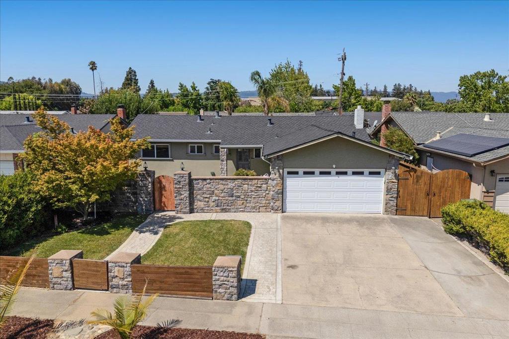 3173 Cyrus Ave welcomes you home! On the end of a quiet, no-through street, this home sets itself apart from all the rest! As you enter through a vibrant well maintained grassy front yard with mature landscaping, you'll pass through a beautiful hand crafted stone entryway creating peace and tranquility. Choose from many places to relax and enjoy the San Jose sunshine including: a private courtyard adorned with planter boxes or the backyard with a fire pit and fountain shaded with palm trees. Complete with 3 spacious bedrooms, 2 bathrooms and a fantastic bonus space off the family room flooded with natural light and a newer roof, this home is well suited to enjoy as is or add your own touches for a modern twist. Location is everything and this home delivers. You're a short walk to local parks, cafes, restaurants, and highly rated Cambrian schools (Branham High School) plus it's conveniently located for your commute near Highway 85, Highway 17 and Almaden Expressway. Pull into your roomy 2 car garage at the end of a long day, kick off your shoes and enjoy cooking a delicious meal, a backyard BBQ with friends and family or order takeout from one of many nearby restaurants. 3173 Cyrus is waiting to greet you in your home sweet home.