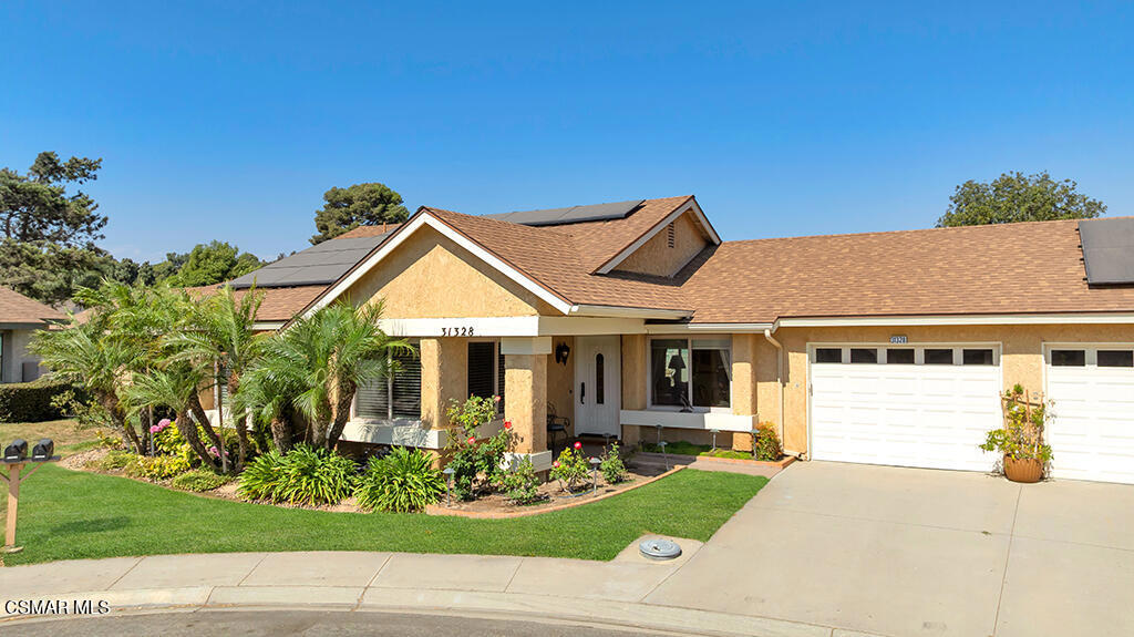 Tucked away on a peaceful cul-de-sac, this beautifully upgraded/ corner home exudes comfort, efficiency, and style. Inside, the open-concept floor plan is enhanced with crown molding, recessed lighting, and dual-pane windows with custom coverings, creating an inviting and light-filled living space. Travertine and real wood floors flow seamlessly throughout, complemented by freshly updated tile work and newer panel doors and fixtures. The remodeled kitchen blends form and function, showcasing granite countertops, a modern sink and fixtures, all-white appliances (including a trash compactor), and anti-slam cabinetry with clever corner storage solutions. The garage has been thoughtfully improved with resin flooring, built-in storage, and a newer electric water heater with expansion tank. Outdoors, enjoy a private stamped-concrete patio, fresh fencing, landscaped grounds, and a matching stamped-concrete front patio for impressive curb appeal. The solar panel system helps keep energy costs low year-round. This move-in-ready gem is located within a vibrant, amenity-rich 55+ community. Don't miss the opportunity to experience the Leisure Village lifestyle!