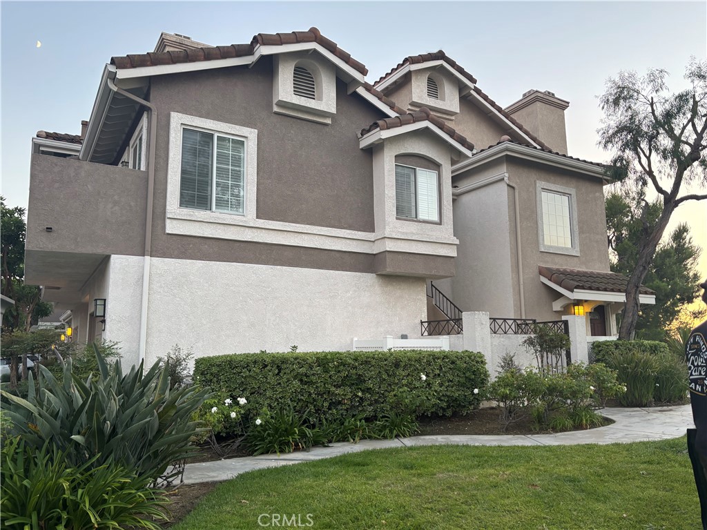 Welcome to this beautiful - 8025 E Sandstone Dr - a stylish 2-bedroom, 2-bath end-unit in the gated Viewpointe community of Anaheim Hills. With no neighbors above or below, this home offers rare privacy and sweeping views from nearly every angle.
Inside, you’ll find bright, open living spaces with laminate flooring, a cozy fireplace, and a private balcony that’s perfect for morning coffee or evening sunsets. The updated kitchen features freshly painted cabinets and modern appliances, while the spacious primary suite includes a spa-inspired bathroom with dual sinks and a custom stone shower.
Parking is a breeze with an attached garage, covered carport, and nearby guest spaces. Viewpointe residents enjoy resort-style amenities like a sparkling pool, three hot tubs, BBQs, firepit, greenbelts, and access to nearby trails. Dining, shopping, golf, and top-rated schools are just minutes away.
This home combines comfort, convenience, and location—don’t miss it!