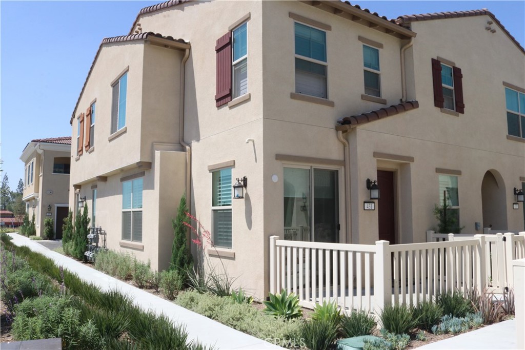 OPEN HOUSE, SATURDAY, AUGUST 9TH 11AM - 2PM Welcome to this beautiful 3-bedroom, 2.5-bath home located in the desirable community of Foothill Grove in Rialto! This well-maintained property features soaring high ceilings that fill the space with natural light and create an open, airy feel. The spacious floor plan includes a convenient upstairs laundry room. No need to lug around baskets! All bedrooms are located on the upper level, offering privacy and comfort. The primary suite comes complete with its own stand up shower, tub, and separated restroom. HOA fees are included in your rent! Solar panel system – paid by owner. Now that's a way to beat those high summer electricity bills! The elementary and middle school are located less than a half mile away! Don't forget about the community pool just walking distance from your front door. Don’t miss out on this opportunity!