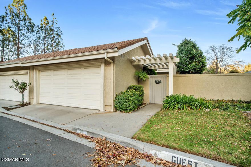 Feels like home! This beautifully remodeled, one-story townhome offers privacy with a fenced front, side, and backyard. The interior boasts high ceilings, wood and tile flooring, and two bedrooms, each with 2 full bathrooms. Highlights include a spacious walk-in closet, a large finished loft with ladder access, custom shutters on all windows and sliding doors, a built-in dry bar, and a cozy fireplace. The two-car garage features custom shelving and laundry hookups. Impeccably maintained, this property is in pristine, move-in-ready condition.