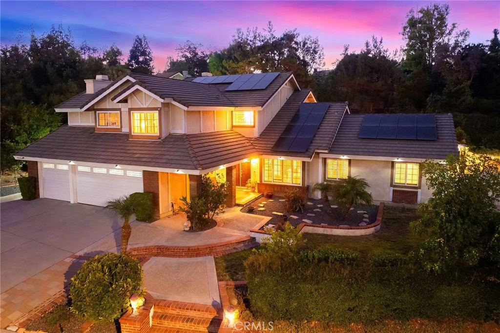 Welcome to Your Dream Home in Via Verde Ridge! This stunning custom built modern home is located in the highly sought-after Via Verde Ridge neighborhood.It features 6 bedrooms, 4 bathrooms, and offers 3,672 square feet of stylish and comfortable living space. In 2012, additional bedrooms and a bathroom downstairs were added with city approval. The kitchen, bedrooms, and bathrooms have been upgraded at 2012 and 2015. The entire house also features updated copper plumbing. Sitting on a large 21,910 sqft landscaped lot, this home blends classic charm with modern convenience. Inside, you’ll find a bright and open layout, Formal living and dining rooms with high ceilings, gourmet kitchen with custom cabinets, high-end range, and cozy breakfast nook. perfect for family meals or entertaining. A private office ideal for remote work, 3 bedrooms and 2 bathrooms on the main floor, Upstairs offers 3 bedrooms and 2 bathrooms. Step outside and enjoy true California living! The spacious backyard includes covered patio, great for barbecues and gatherings, Room for kids and pets to run and play. Attached 3-car garage, a private Zen room. Perfect for yoga, meditation, or an art studio The expansive backyard features a covered patio ideal for weekend barbecues, lush landscaping, and plenty of space for kids and pets to play.This home comes with fully paid solar panels, offering you energy efficiency and long-term savings. It's a sustainable choice that complements the modern amenities and thoughtful design throughout the home.Located in a top-tier school zone, new homeowners have the unique option to enroll their children in either the San Dimas or South Hills School District. adding flexibility and value to an already exceptional home.