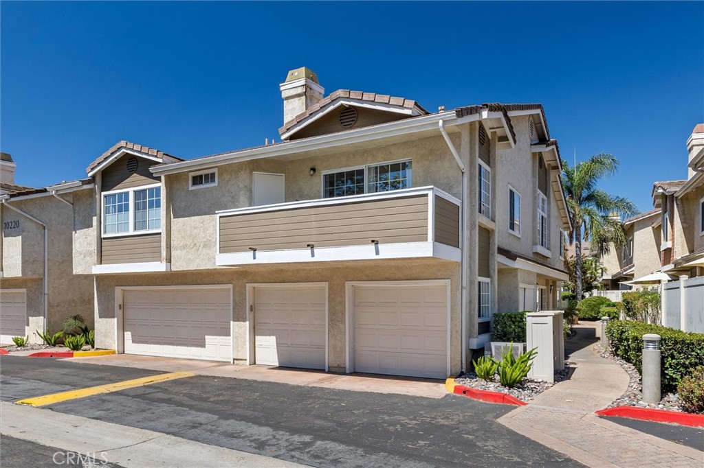 Welcome to this delightful and sunny townhome! As you step inside, a cozy carpeted staircase leads you to the main living area, which features vaulted ceilings. The open-concept design seamlessly connects the living area to the kitchen and dining rooms. The kitchen is beautifully equipped with stainless steel appliances, a lovely tile backsplash, bright white cabinets, and quartz countertops. The entire home boasts fresh paint, new carpeting, and newer luxury vinyl planking, creating a modern and inviting ambiance. You'll find two spacious bedrooms, each with large closets and large windows that fill the rooms with natural light. The primary bedroom includes its own full bathroom, and an additional full bath is conveniently located down the hallway. There's ample storage throughout the home, including a coat closet at the entry and a spacious closet off the deck. For your convenience, a newer front-loading full-size washer and dryer are included and located in the laundry closet in the hallway, and the direct access garage leads right into the entry. The community itself is an oasis, with lushly landscaped greenbelts and pathways that wind through the neighborhood, leading you directly to the clubhouse, pool, spa, and a charming bridge over fountains. Enjoy the nearby River Walk, Santee Lakes Recreation Preserve, proximity to La Jolla and more! Welcome home!
