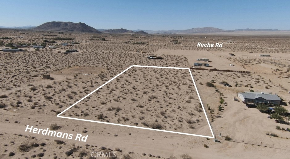 Over 2 Acres of Untouched Desert Beauty – Utilities Nearby, Views for Days
Discover your slice of the Hi-Desert on this just-over-2-acre parcel in Landers, where water and power are available at the street, and the possibilities are as vast as the views. Set against the stunning backdrop of Goat Mountain to the northwest, this lot offers ultimate seclusion, breathtaking sunrises and sunsets, and is conveniently located less than a mile from paved road access. Whether you're dreaming of building a getaway, investing in future growth, or simply claiming your own peaceful spot in the desert, this land is a blank canvas ready for your vision. Privacy, access, and natural beauty—this is Hi-Desert potential at its finest. Lot lines in phones are approximations. Buyer to verify access to utilities through due diligence.