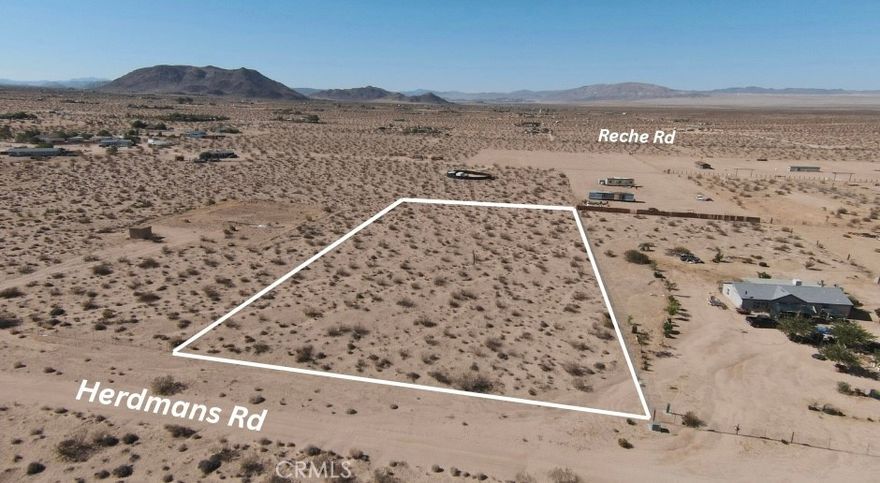Over 2 Acres of Untouched Desert Beauty – Utilities Nearby, Views for Days

Discover your slice of the Hi-Desert on this just-over-2-acre parcel in Landers, where water and power are available at the street, and the possibilities are as vast as the views. Set against the stunning backdrop of Goat Mountain to the northwest, this lot offers ultimate seclusion, breathtaking sunrises and sunsets, and is conveniently located less than a mile from paved road access. Whether you're dreaming of building a getaway, investing in future growth, or simply claiming your own peaceful spot in the desert, this land is a blank canvas ready for your vision. Privacy, access, and natural beauty—this is Hi-Desert potential at its finest. Lot lines in phones are approximations. Buyer to verify access to utilities through due diligence.