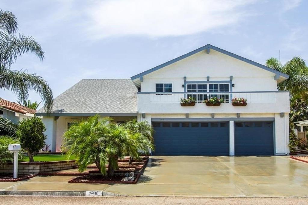 This stunning oversized 3-bedroom + loft home boasts a modern design, remodeled in 2018. • Its expansive open floor plan flows seamlessly into a California sunroom and out to the large backyard, providing breathtaking views. • Inside, enjoy quartz countertops, recessed LED lighting, and a spacious walk-in master closet. • Appliances include a washer, dryer, and fridge, with central heating and A/C for comfort year-round. • Additional perks include a full-house fan for efficiency, a 3-car garage, and a generous backyard with fruit trees. The lease covers all kitchen appliances, washer /dryer, and gardening services. • Please note that the home is unfurnished, provided pictures are for informational purposes only. • Enjoy panoramic views from both the backyard and second floor, offering a serene atmosphere atop the hill. • Located just minutes from the commercial district and Mira Costa College, this home is ideal for those seeking convenience. • Residents also have access to nearby gyms, workplaces, and schools such as San Dieguito Academy and North Coast Charter School! • (The spa does not function • Call for pet policy • All showings to be conducted by owner)