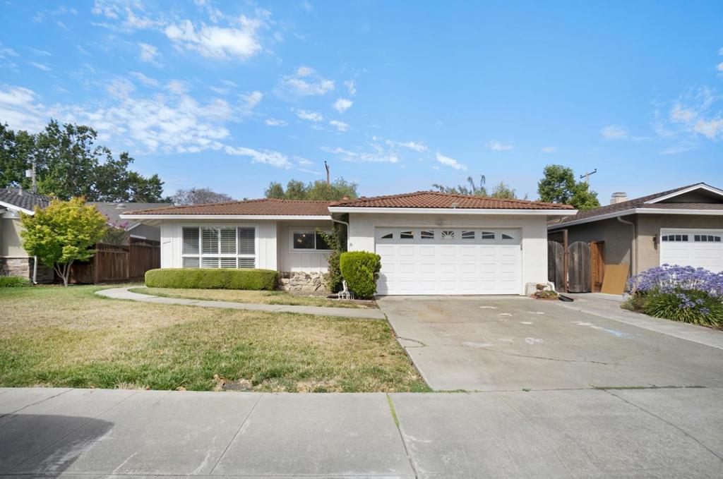 Gorgeous 3-bedroom home in a cul-de-sac, now ready for move-in! Blessed with natural light, this entertainers dream welcomes you with a spacious and flexible open floor plan with double-paned windows, giving you verdant views of the front lawn and the neighborhood. Enter the family room and lounge by the cozy fireplace, or slide the glass doors open and enjoy the shade of fruit trees! Extra security is also provided with a Ring doorbell and security cameras installed. Overlooking the living room is your modern full kitchen with easy-care tiled flooring and outfitted with generous countertops and cabinets that bring out the excitement in home cooking. Installed appliances include a French door refrigerator, oven/range paired with hood, microwave, and dishwasher. No need to go out for laundry - washer and dryer machines are already installed in the spacious 2-car garage! Your new home is perfect for planting roots. Costco, Nob Hill, park, and quite good restaurants nearby!