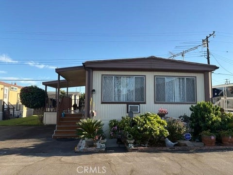 Photo of 16601 S Garfield Avenue #312, Paramount, CA 90723 (MLS # DW26198086)