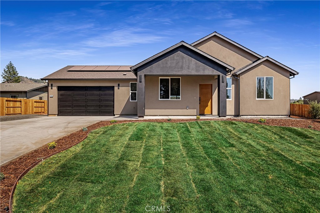 Looking for a nice tucked away affordable home with great views of Sawmill Peak? This might be it! Come check it out this dream house, priced just right with RV access on the right side. Walking into the home you will be greeted with a open layout. With a nice warm fireplace in the living room. Home Features 2 bedrooms 2 full baths. Lots of upgraded to many to list, paid off solar. Fenced all around, rear fence raised for more privacy. This home has it all. Don't wait to see it. Wont last long.