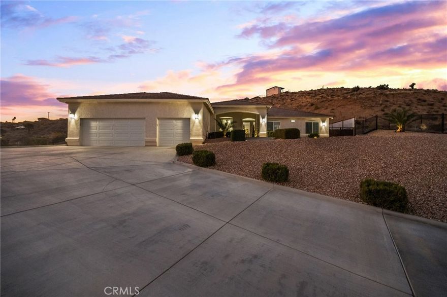 This LAKE VIEW sanctuary offers a lifestyle of unparalleled beauty and comfort, perched to capture breathtaking, unobstructed views. Enclosed within a private, gated compound, this resort-style property spans over 27,000 square feet, providing ample space for relaxation and entertainment. The home’s thoughtfully designed floor plan connects the gourmet kitchen—complete with stainless steel appliances, a spacious center island, granite countertops, and recessed lighting—to an inviting informal dining area. The Great Room serves as the heart of the home, featuring high ceilings, large garden windows that flood the space with natural light, and a sophisticated fireplace. For more intimate gatherings, the formal dining area exudes charm and warmth. The deluxe primary suite is a haven of comfort and privacy, situated in its own wing. It features an oversized window with serene views of the manicured backyard, recessed lighting, and a ceiling fan for added comfort. The en-suite bathroom is a masterpiece, offering dual vanity sinks, a soaking tub, and a walk-in shower. The three additional bedrooms are thoughtfully arranged and share a beautifully designed bathroom. Step outside to your private oasis. Here, you’ll find a sparkling above-ground pool, a cozy fire pit surrounded by a sitting area, and expansive grounds ideal for hosting unforgettable gatherings. All of this is framed by meticulously landscaped greenery that enhances the property’s natural beauty. Additional features include custom flooring throughout, a spacious three-car garage with high ceilings, and low-maintenance front and back yards. This home is a testament to luxury living, blending comfort with sophistication in every detail with no HOA or Mello Roos. Welcome to your dream retreat—where life’s finest moments await.