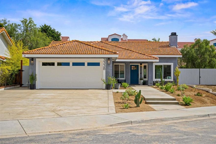 Welcome to this single level, stunning 3 bedroom, 2 bath home situated on a spacious corner lot in the Pacific Views neighborhood in Oceanside. No HOA with a community feel! Thoughtfully updated with modern finishes throughout, this home offers comfort, style, and functionality. The bright, open-concept floor plan flows from the living area to kitchen featuring a large island, stainless steel appliances, and sparkling quartzite countertops. The oversized lot offers ample space for a pool, ADU, or your dream backyard oasis. Plenty of room for entertaining and expanding! Located minutes from shopping, dining, and beaches! Don't miss this rare opportunity - move-in ready in an amazing location!