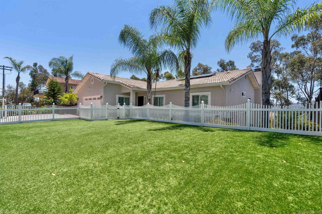 A must see! Totally turn-key home with lots of possibilities! The home offers plenty of space for a large family to stretch out. With a seperate entrance as an option, the bottom floor can be used as a possible income/rental space. The current downstairs bar can easily convert into a second kitchen. BRAND NEW ROOF, NEW PAINT inside & out, solar, and views! The incredible bonus space with a large full bar is an entertainer’s dream - so much room for activities! The LARGE, fully gated, front yard gives kids and pets a safe place to play, while the back gives views and more space to entertain, including multi-level decks and a horseshoe/corn hole pit. Convenient freeway access! Close to tons of shopping!