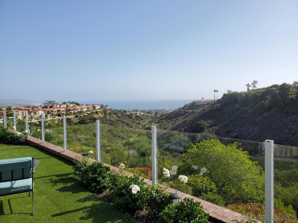 Agents: Pls note Conf remarks. A magnificent home with breathtaking ocean views as well as canyon and greenbelt. Overlooking the ocean and canyons. Extremely well maintained and upgraded. One story and one bedroom is slated for office space. Luscious landscaping. Stainless steel appliances and granite counters. Atrium garden with waterfall. Located in the gated community of Crystal Bay with community pool, tennis courts and exercise room. Some pets are allowed